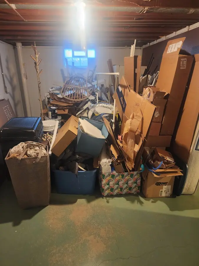 Roll-off dumpster container at job site for 15 Yard Dumpster Rental in Wasilla